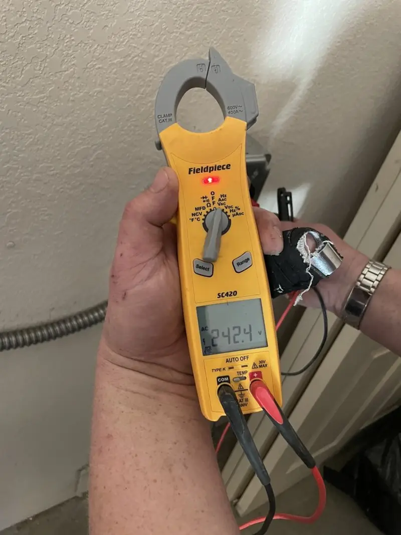 Voltage testing with clamp meter during Hot Tub / Pool Electrical Wiring in Mount Gilead